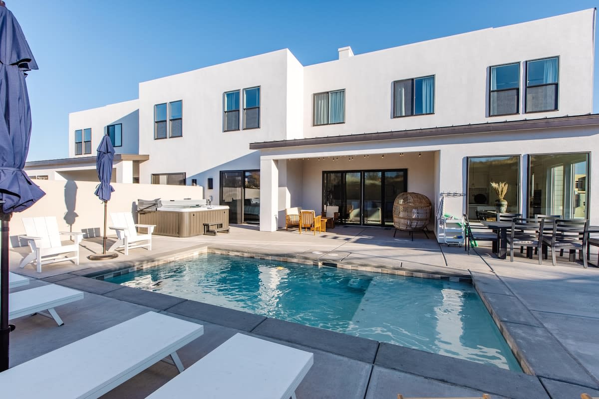 Private pool and patio at a Southern Utah vacation home with desert views